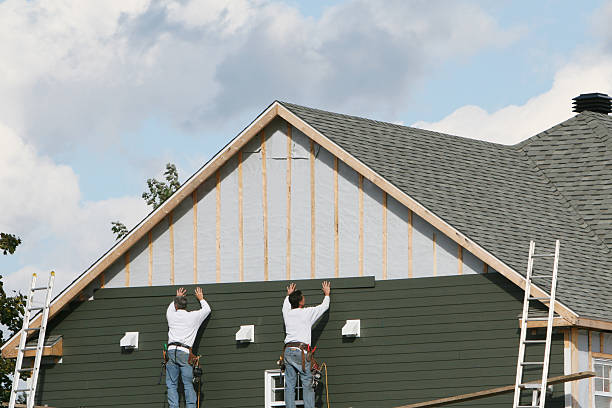 Professional Siding Installation technician working in Camp Hill, PA
